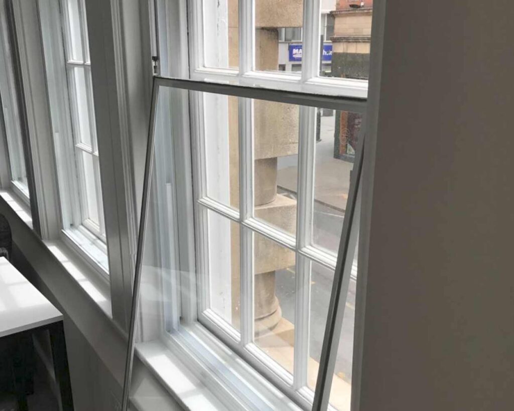 White Vertical sliding Secondary Glazing